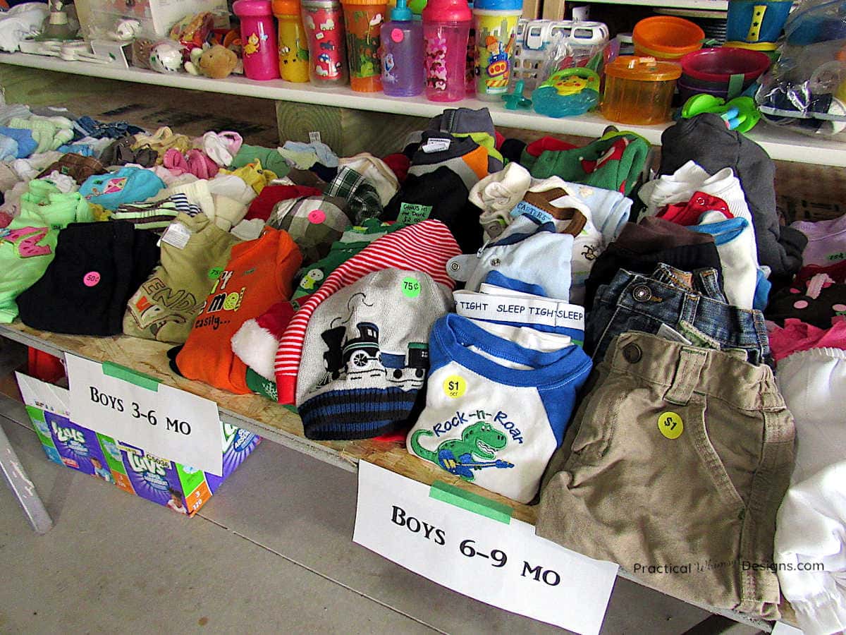 Items organized on a table for a garage sale