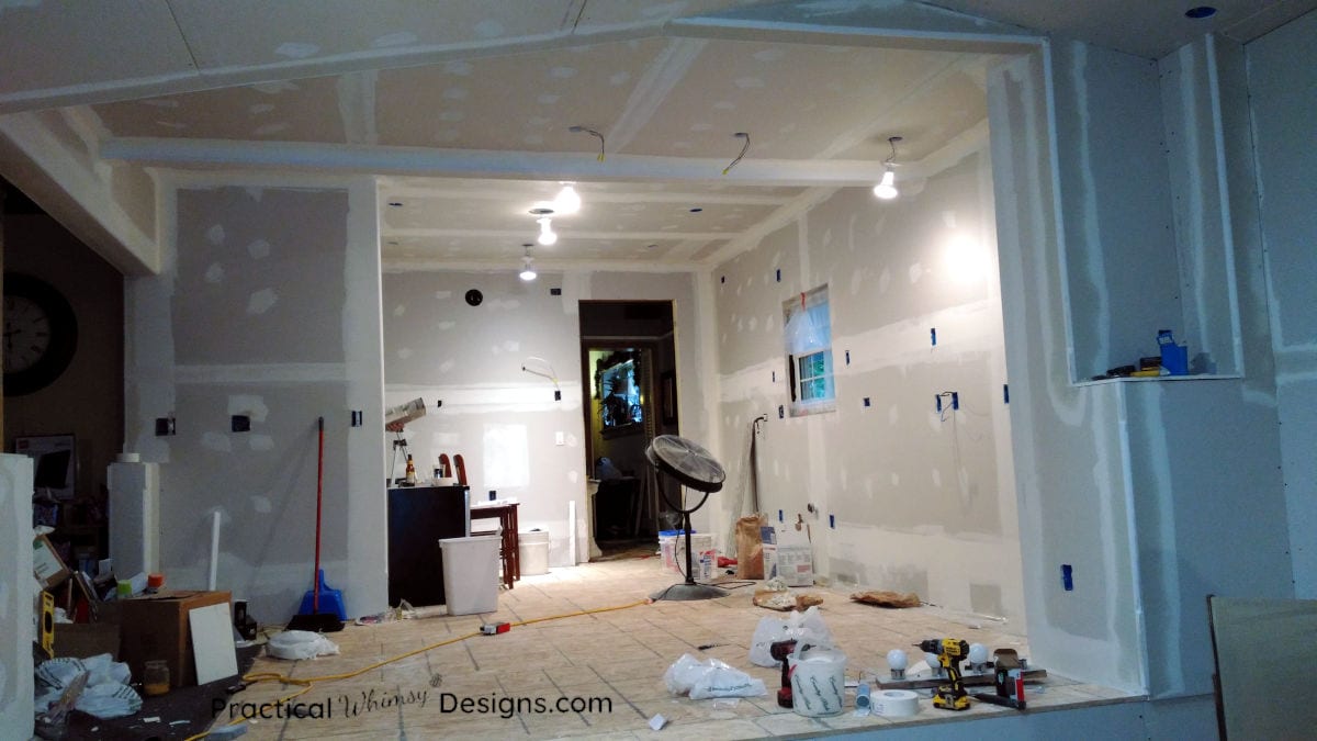 Kitchen with new drywall and mud