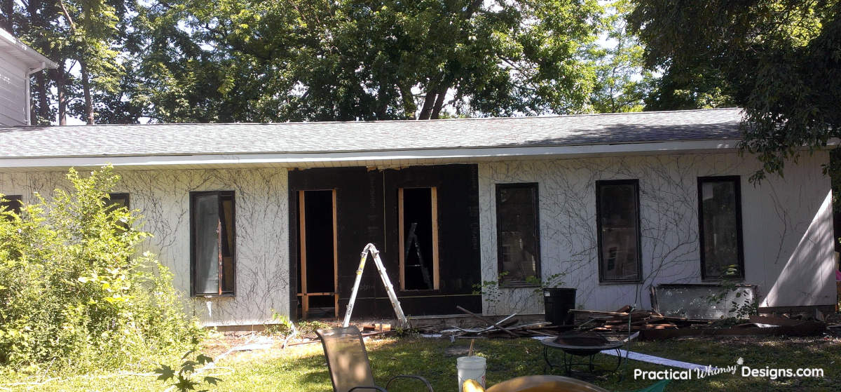 Paneling removed from rundown pool house