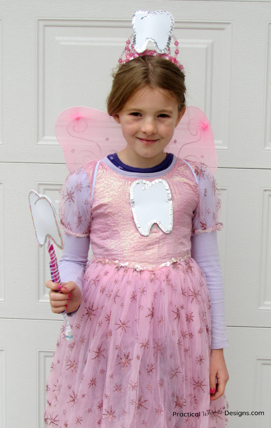 Little girl wearing DIY tooth fairy costume