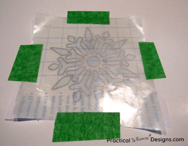 Taping snowflake decal