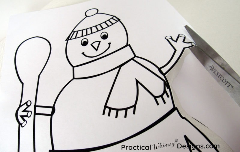 Cutting out snowman template for lighted canvas pictures