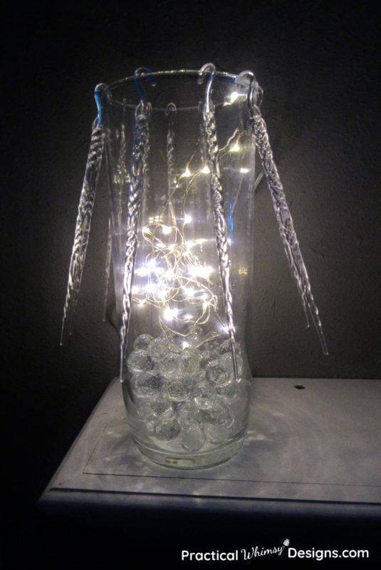 Vase light with icicles on it