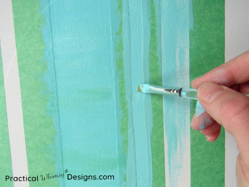 Painting background color on birch tree painting