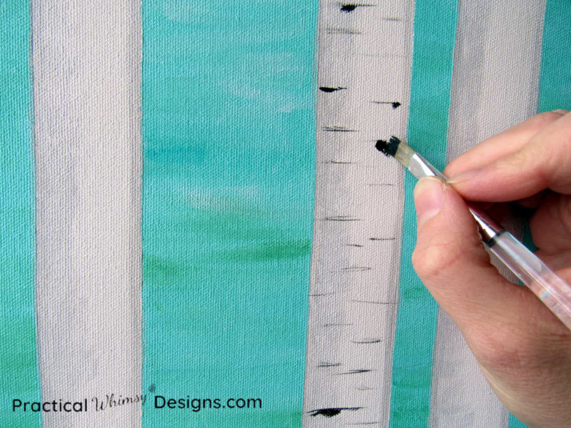 Painting birch tree knots on birch tree painting