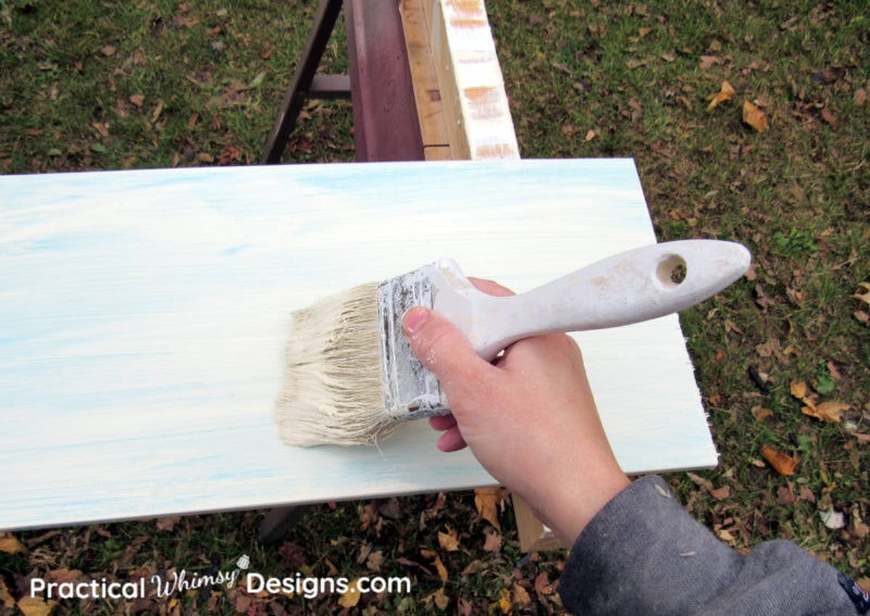 Painting board to distress painted furniture