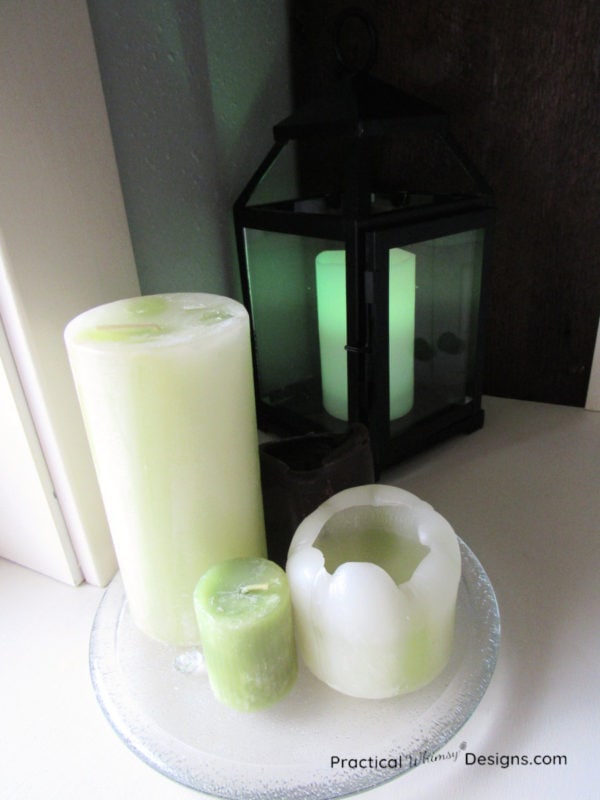 Green candles and lantern