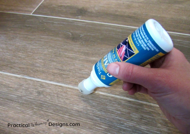 Sealing grout line with a sealer