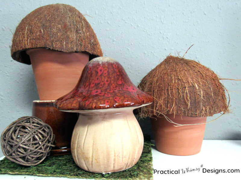 Three mushroom decorations on shelf