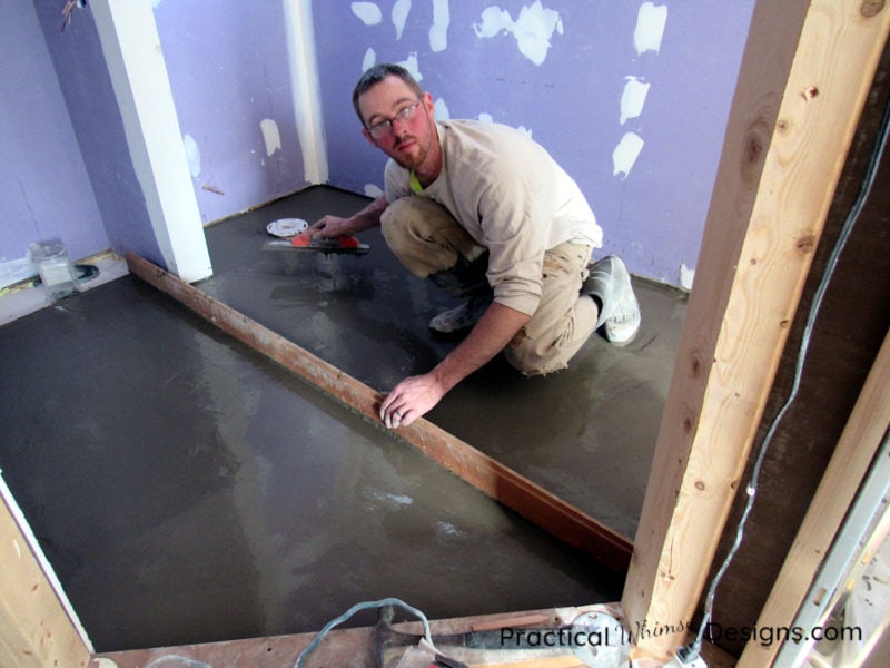 Putting leveler onto the Master Bathroom floor