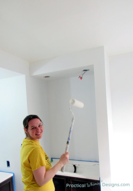 Paint rolling ceiling in Master Bathroom ORC week 4 renovation