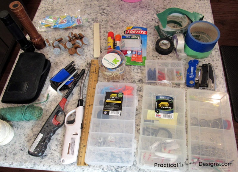 Junk Drawer Items Sorted in piles on counter