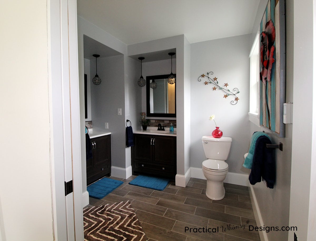 Master Bathroom Reveal with picture of sinks and toilet