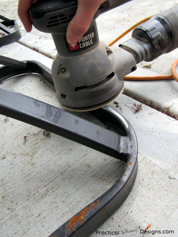 Sanding chair base with sander