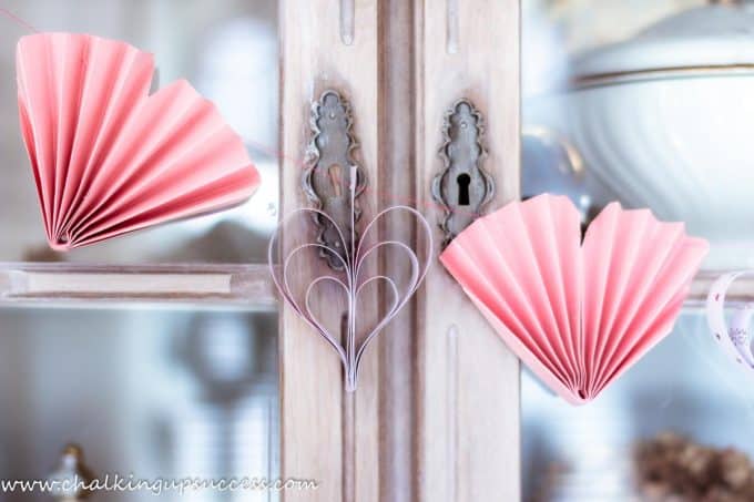 3D Heart Garland hanging on cabinet