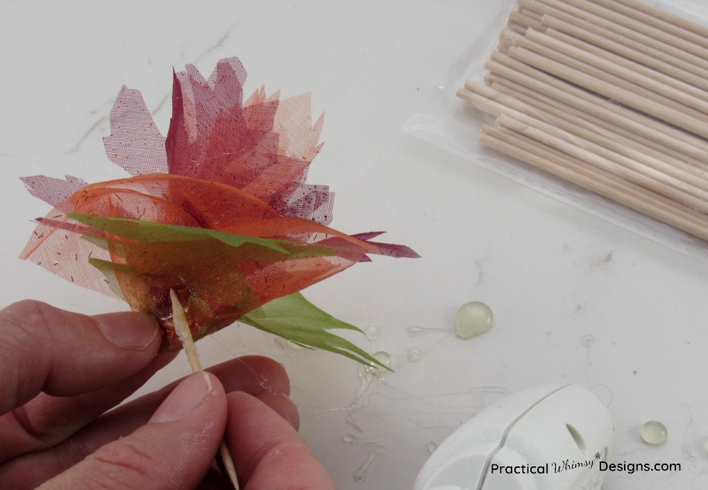 Adding leaves to bottom of flower as final step.