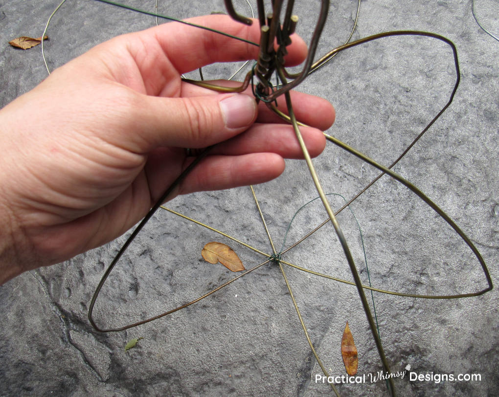 Adding hangers to make sides of pumpkin