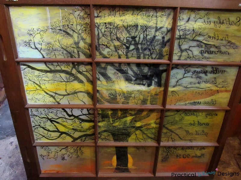 Back of faux DIY stained glass art window painting of tree.