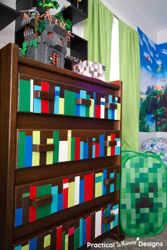 Faux bookshelf dresser and creeper hamper in themed video game bedroom