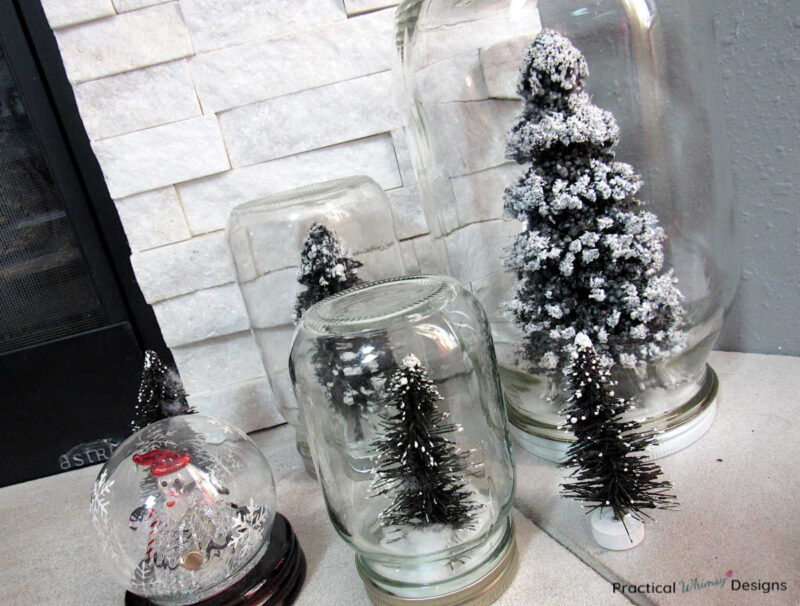 Bottle brush tree snow globes.