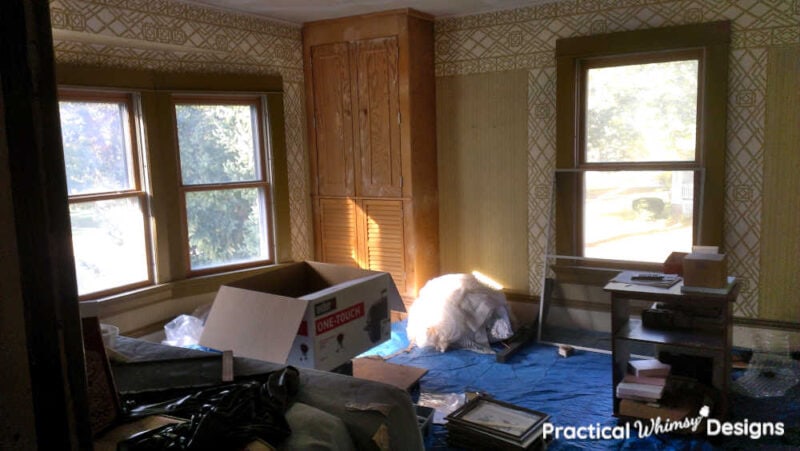 Boys bedroom full of clutter before remodeling