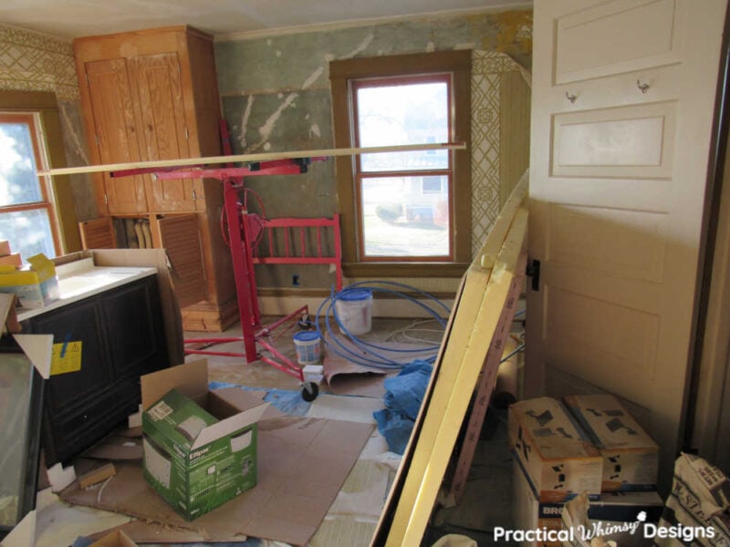 Bedroom full of construction items during remodel