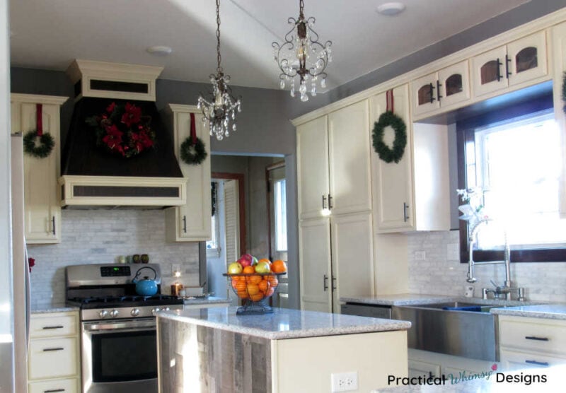 Kitchen decorated for Christmas with wreaths