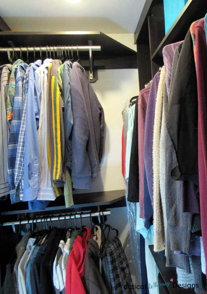 Clothes hanging in master closet