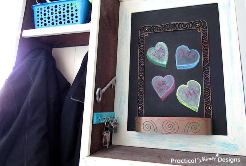3D conversation heart chalkboard art hanging in mud room by coat