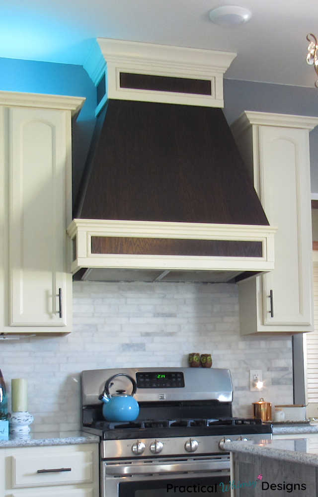 Custom wooden range hood in kitchen