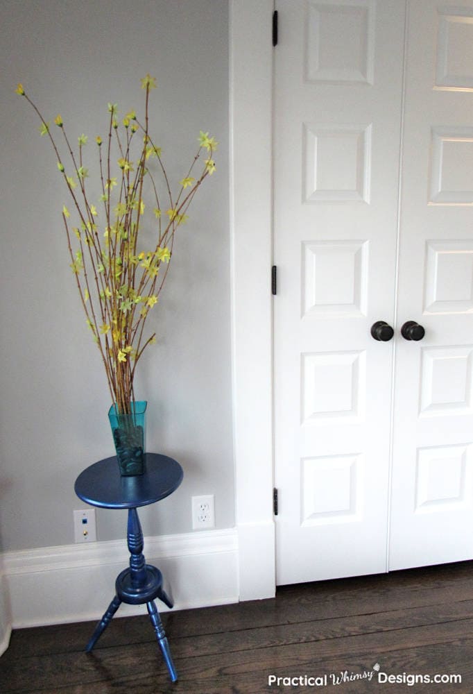 Side table with flowers.