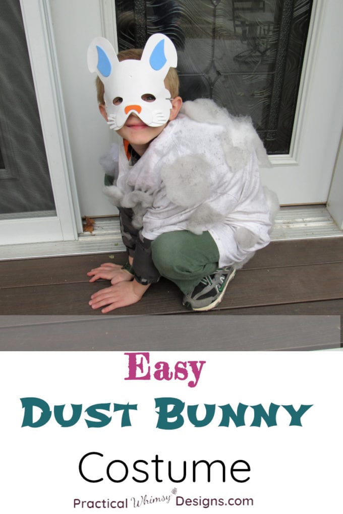 Easy Dust Bunny costume. Boy wearing bunny mask and dust bunny costume crouched on step.