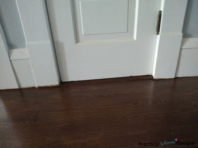 Hardwood flooring finished after filling gaps with wood filler.