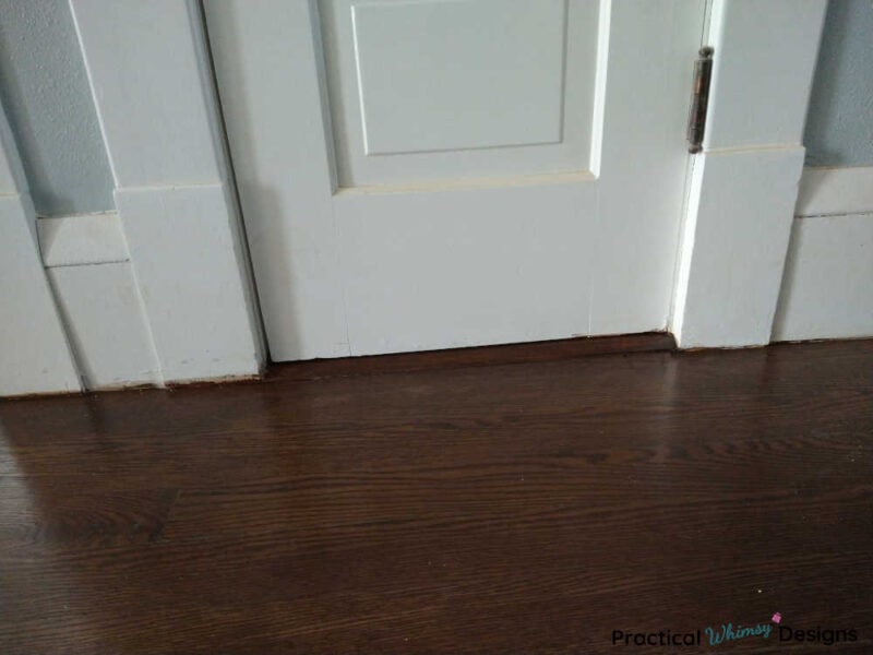 Hardwood flooring finished after filling gaps with wood filler.