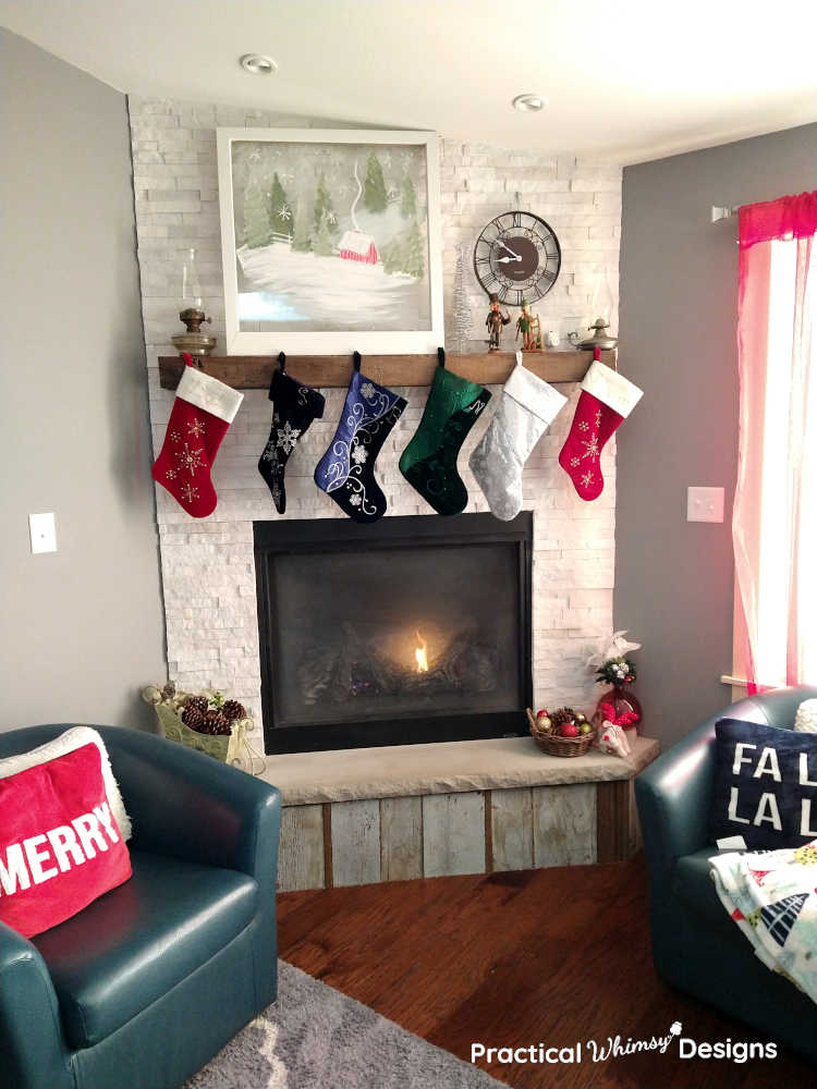 Fireplace with stockings hanging above it