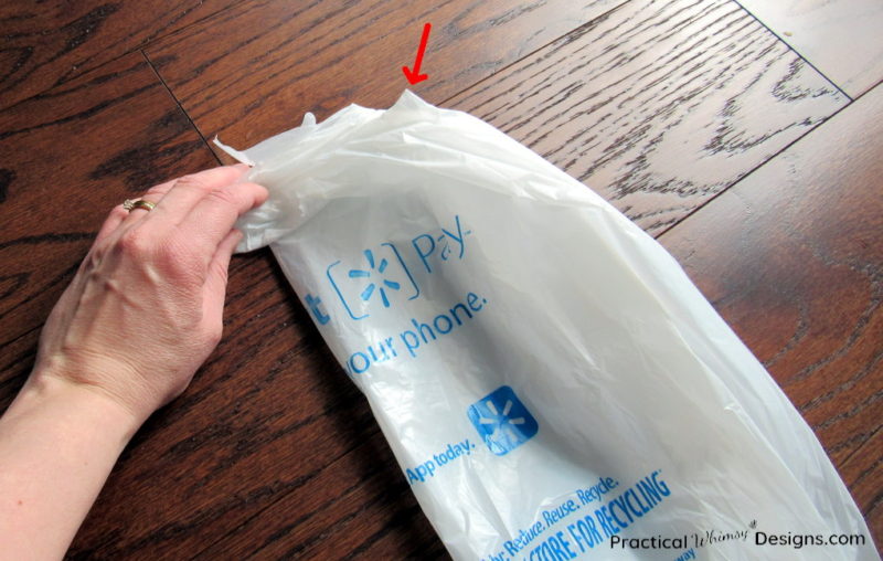 Folding bag handles across the bag