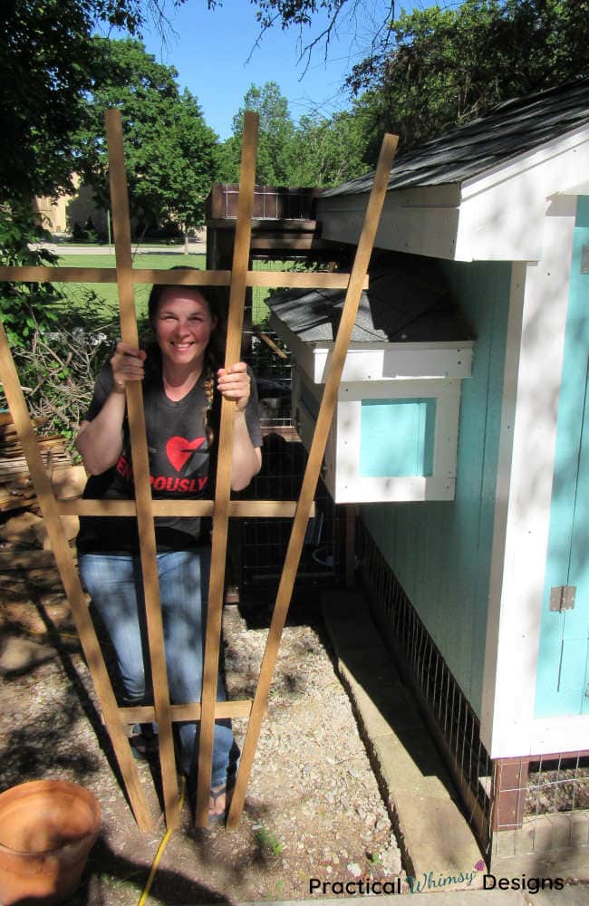 Posing with the easy garden trellis.