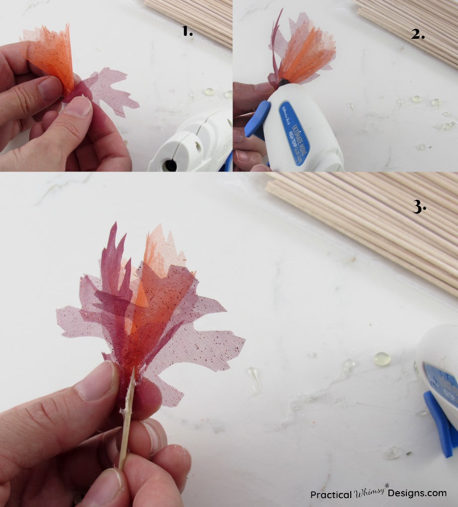 Adding more leaves to the flower and gluing them together with hot glue.