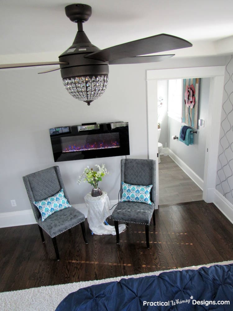 Master bedroom fireplace and chairs