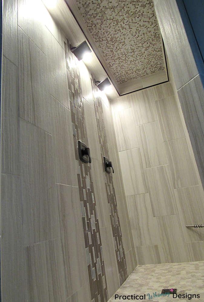 Master shower with cleaned and sealed grout lines.