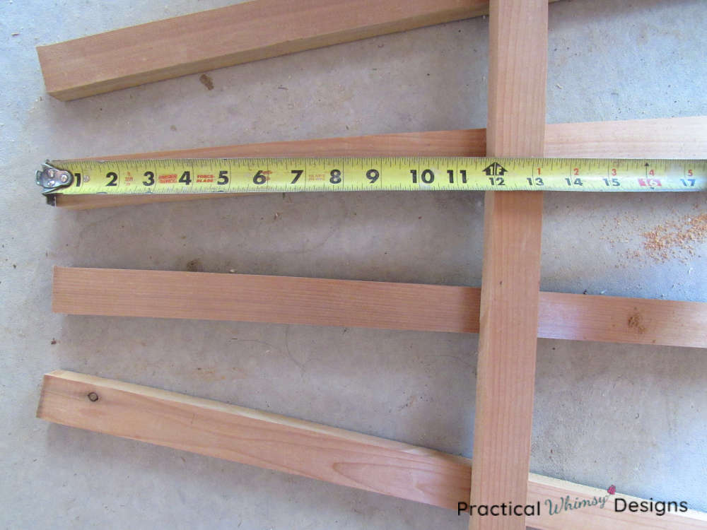 Measuring bottom of trellis.