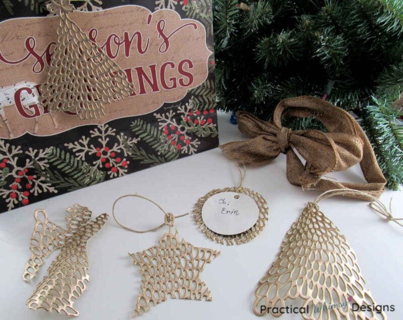 Gold ornament gift tags made out of placemats.