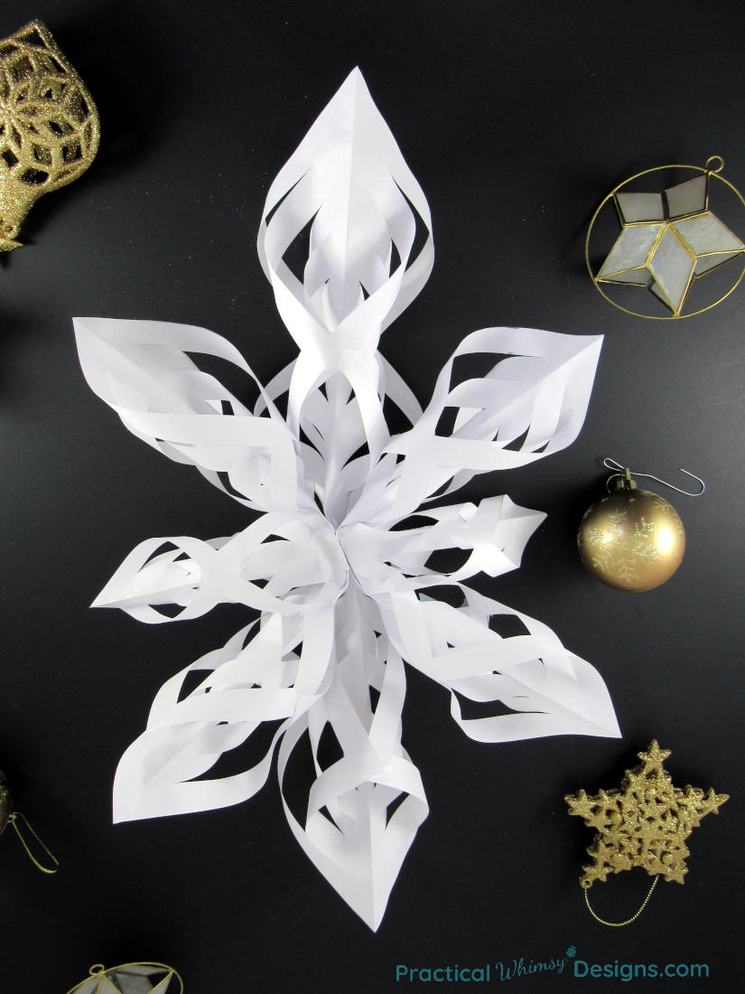 Twisted paper star with ornaments