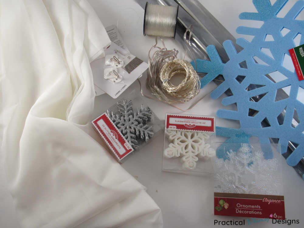 Supplies for making a snowflake lighted curtain