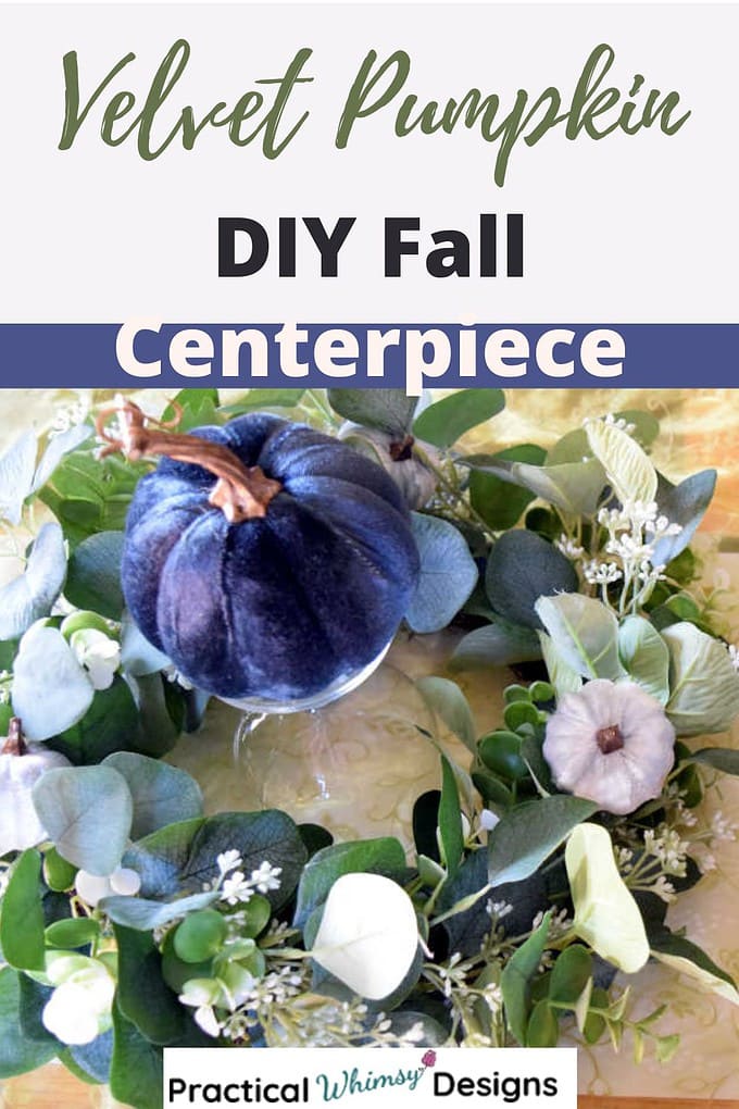 Blue velvet pumpkin and wreath DIY fall centerpiece on table.
