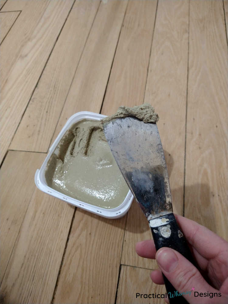 Wood filler on a putty knife