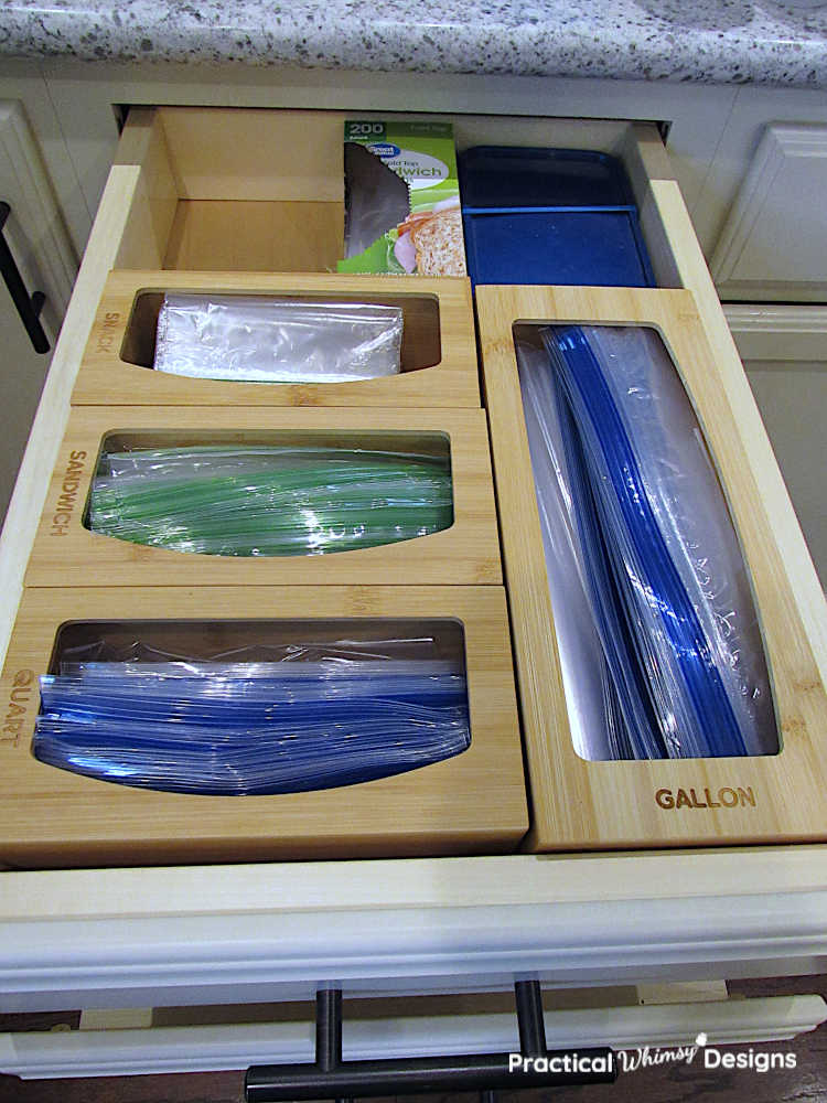 Ziploc bags in bamboo storage containers in kitchen drawer.